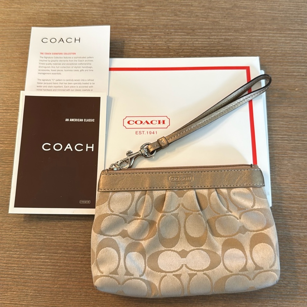 Coach Signature Collection Wristlet. Metallic gold leather/fabric.